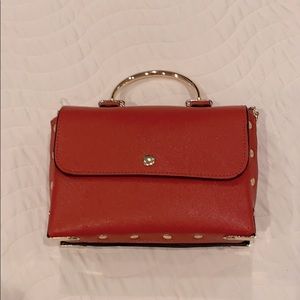 Adorable top handle with chain brick red bag